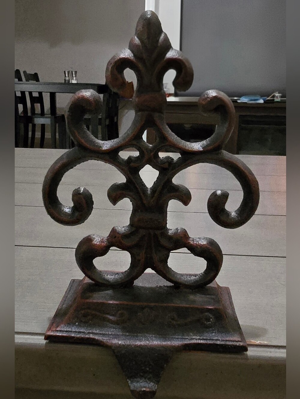 Decorative Fleur-de-Lis Cast Iron Mantle Stocking Holder in Rust Brown